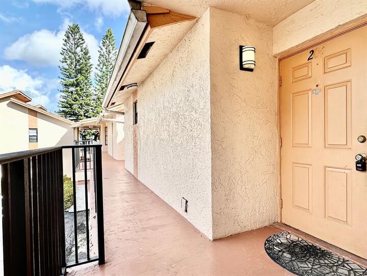 Property Photo:  1917 NW 94th Av 204A  FL 33071 