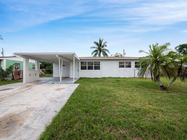 Property Photo: 133 NW 14th Avenue FL 33435