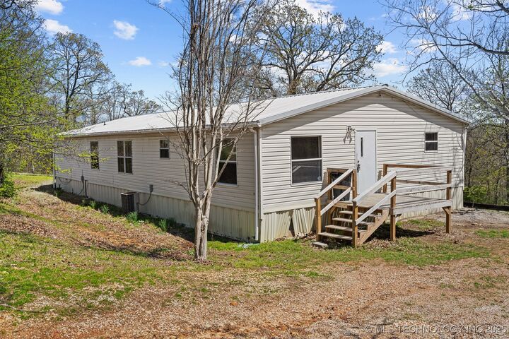 Property Photo:  100989 S 4533 Road W  OK 74962 