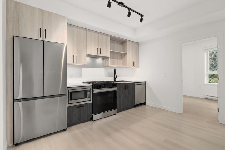 Property Photo:  1100 Clarke Road 303  BC V3H 0N3 