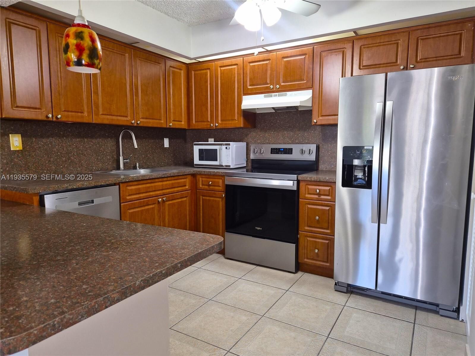 Property Photo:  8811 SW 132nd Pl 203cw  FL 33186 