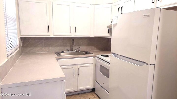 Property Photo:  419 N Fiske Boulevard  FL 32922 