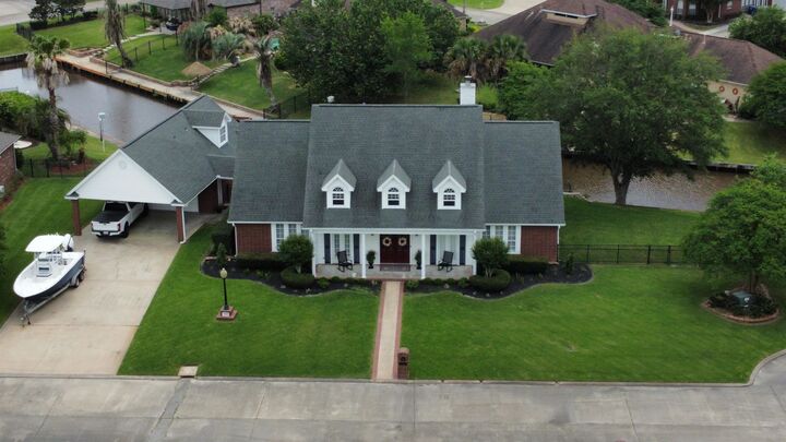 Property Photo: 405 Waterwood Dr. TX 77630-8238