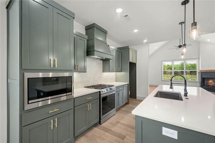 Property Photo:  4802 SW Scarlet Oak Street  AR 72713 