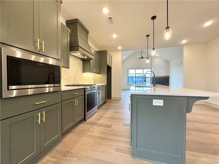 Property Photo:  4802 SW Scarlet Oak Street  AR 72713 