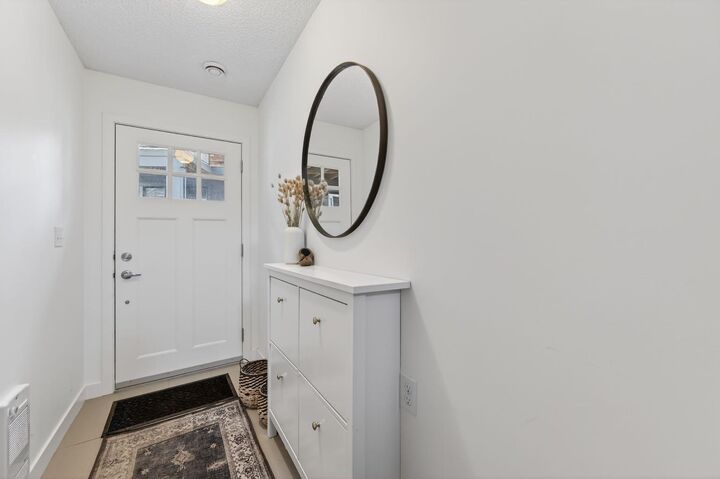 Property Photo:  235 Ascot Circle SW  AB T3H 0X2 