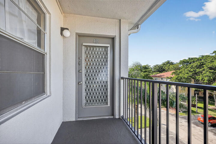 Property Photo:  101 SW 132nd Way 418J  FL 33027 