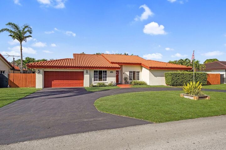 Property Photo:  18910 W Oakmont  FL 33015 