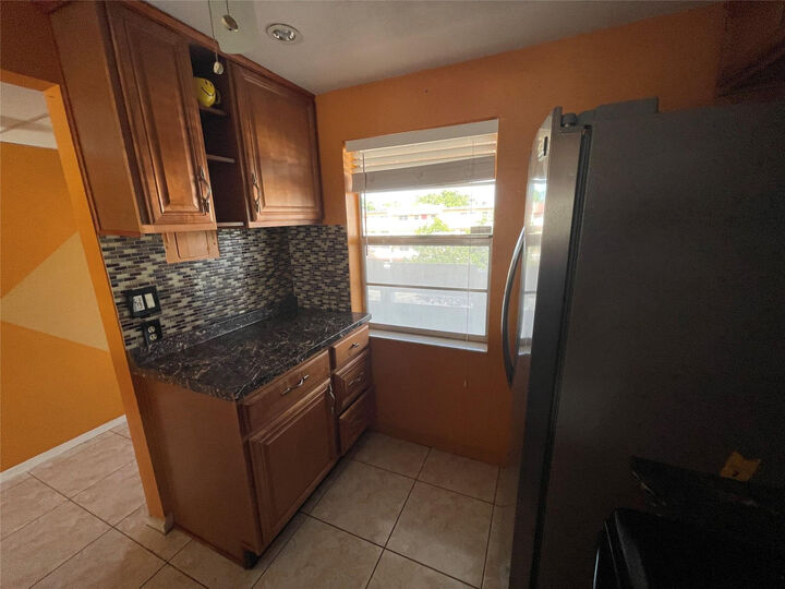 Property Photo:  1025 Country Club Drive 407  FL 33063 