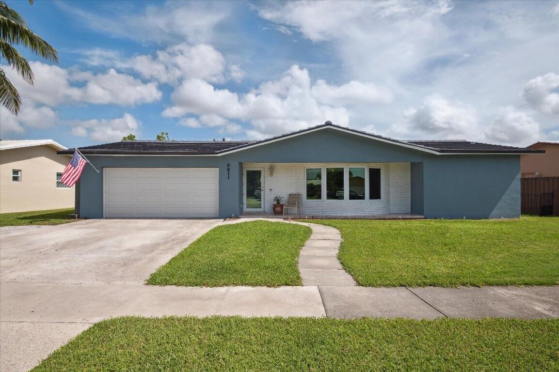 Property Photo:  6611 NW 21st Street  FL 33063 