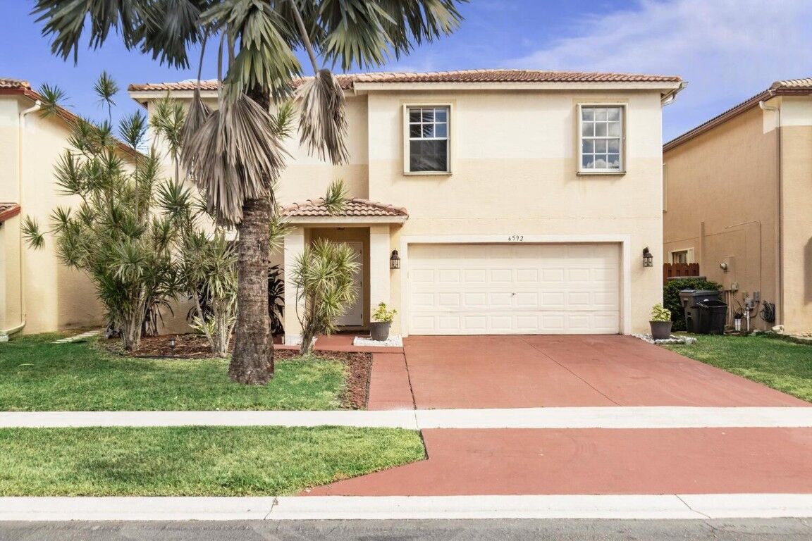 Property Photo:  6592 Rivermill Club Drive  FL 33463 