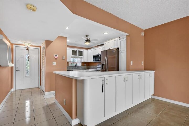 Property Photo:  9410 N Hollybrook Lake Dr 303  FL 33025 