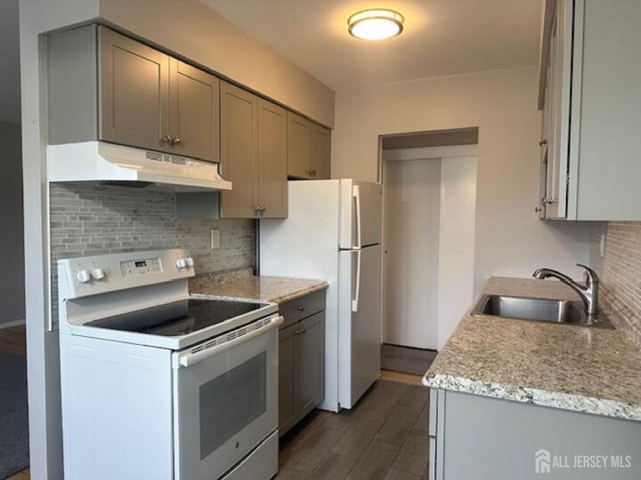 Property Photo:  61 Stonehurst Boulevard F  NJ 07728 