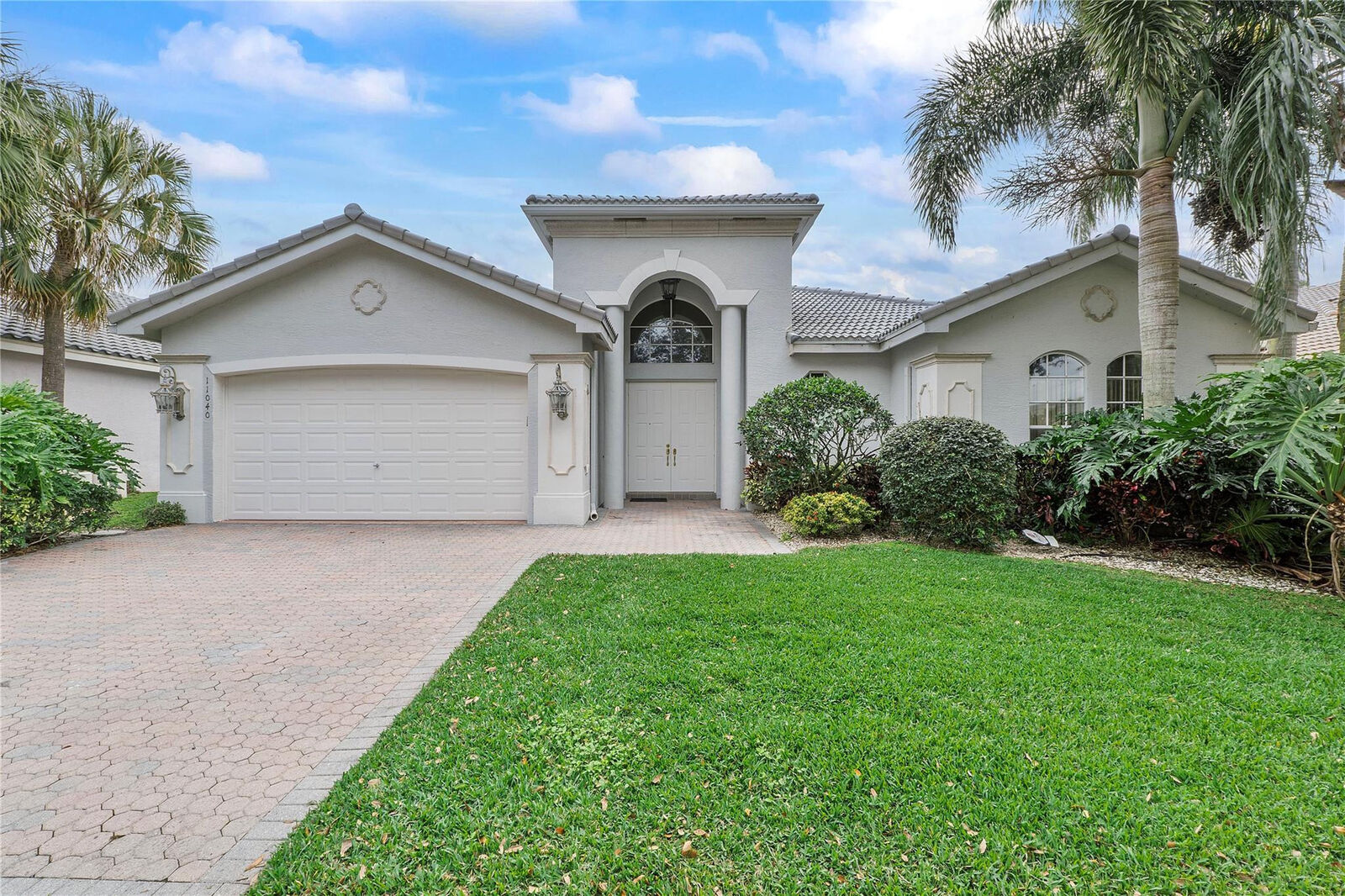 Property Photo:  11040 Malaysia Circle  FL 33437 