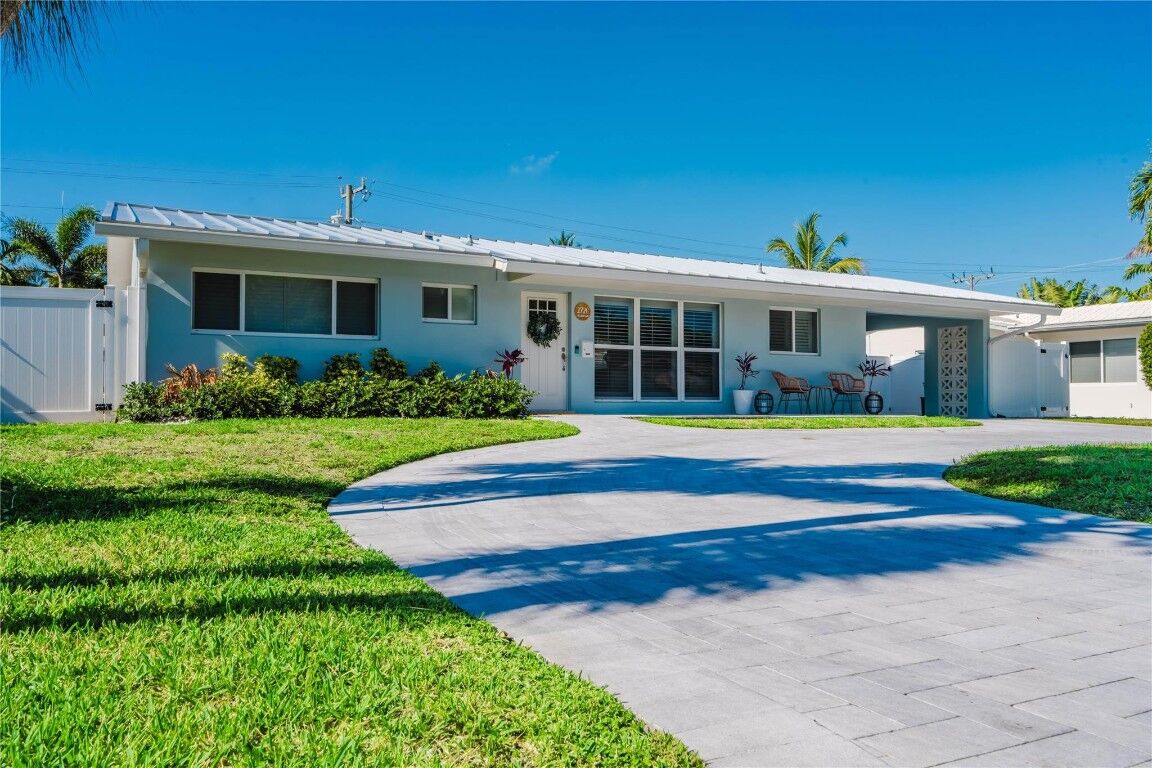 Property Photo: 2720 NE 53rd Court FL 33064