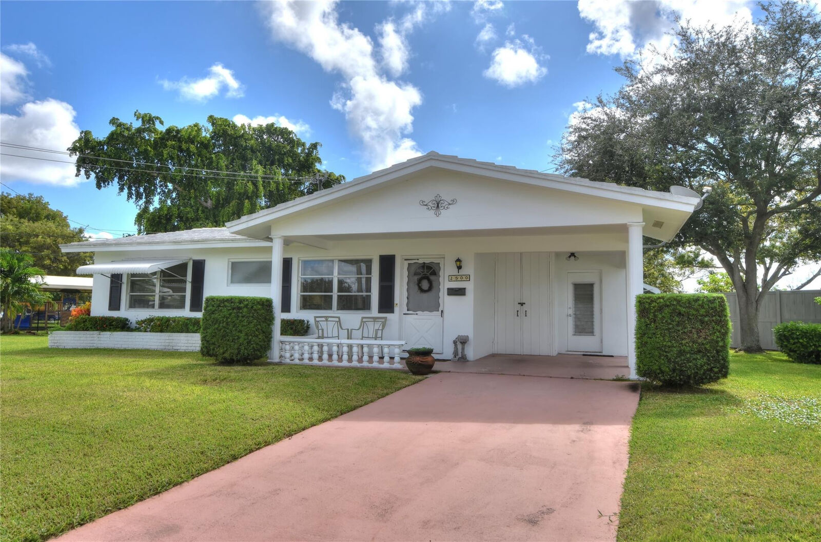 Property Photo:  2500 NW 48th Street  FL 33309 