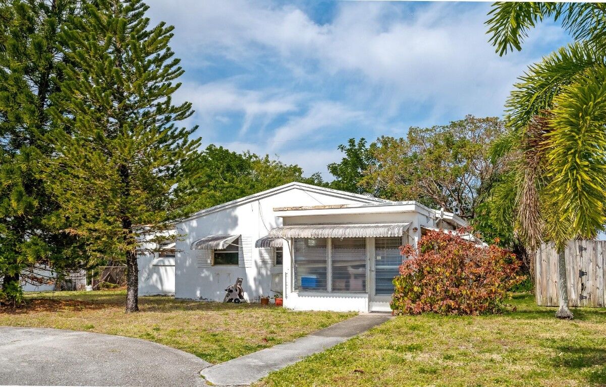 Property Photo:  631 NE 57th Street  FL 33334 