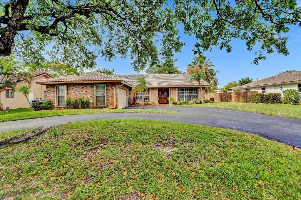 Property Photo:  11459 NW 18th Manor  FL 33071 