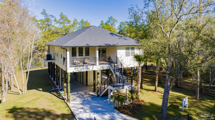 Property Photo:  7746 River Rd  FL 32583 
