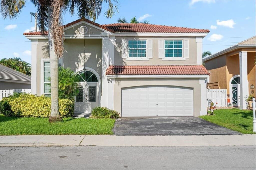 Property Photo:  611 Royal Palm Way  FL 33325 