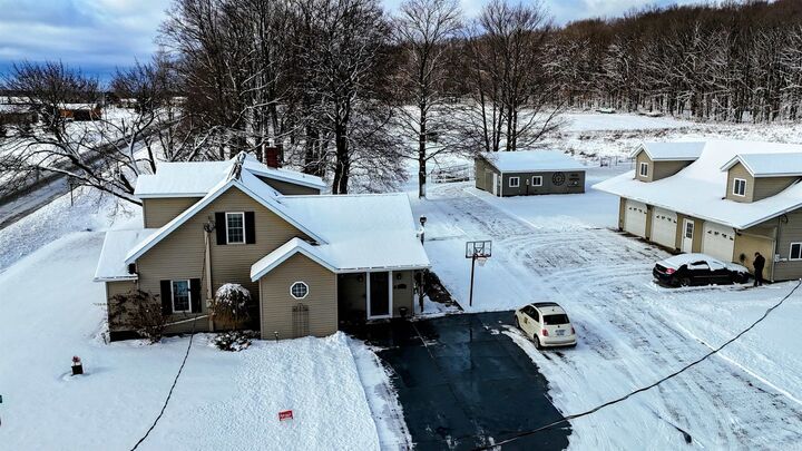 Property Photo:  6987 E Beaverton Road  MI 48617 