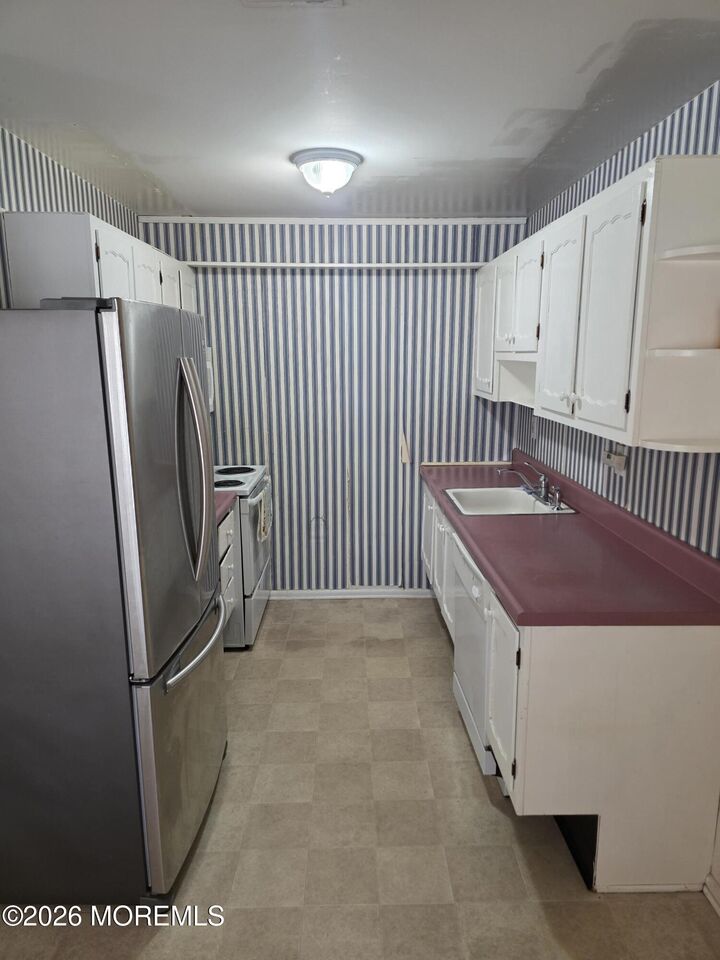 Property Photo:  316 Coventry Court E  NJ 08701 