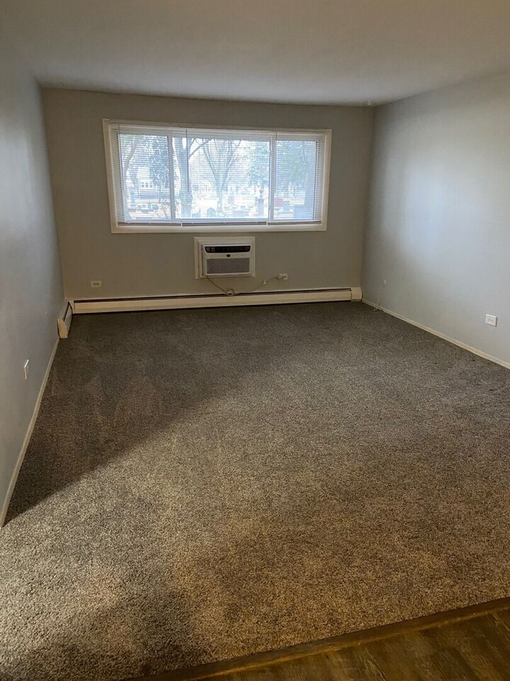 Property Photo:  8541 Lotus Avenue 711  IL 60077 