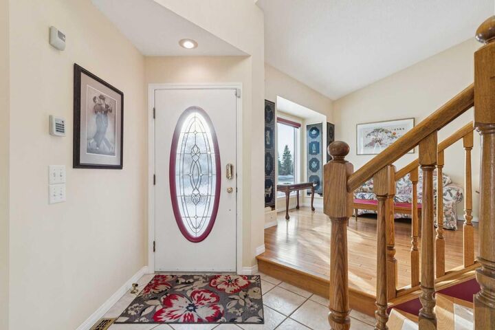 Property Photo:  181 Woodford Drive SW  AB T2W 4C2 