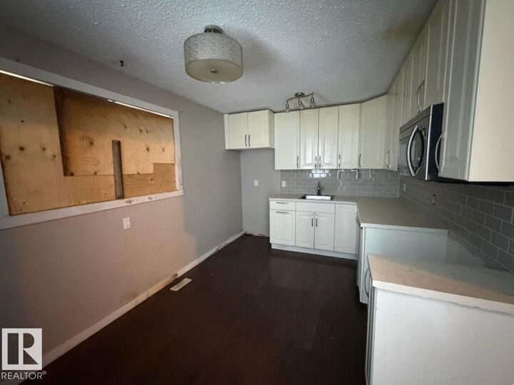 Property Photo:  1925 73 Street NW  AB T6K 2B6 