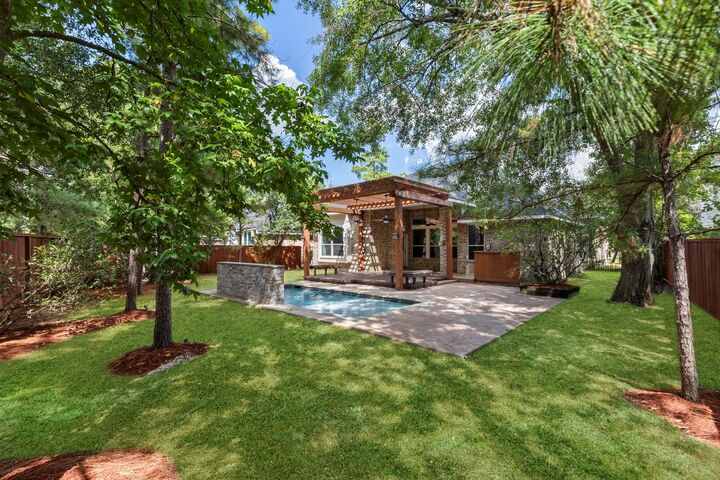 Property Photo:  70 N Rocky Point Circle  TX 77389 