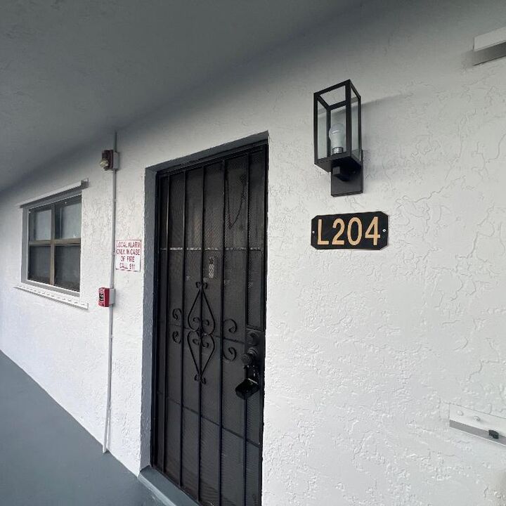 Property Photo:  2141 Woolbright Road L204  FL 33426 