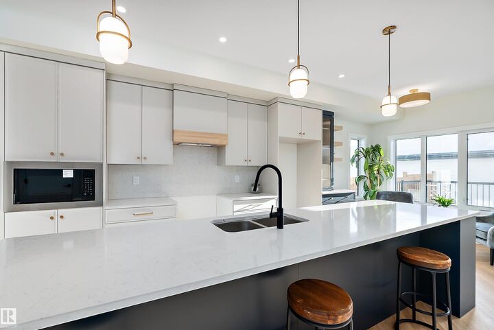 Property Photo:  7509 Rowland Road NW  AB T6A 3W4 