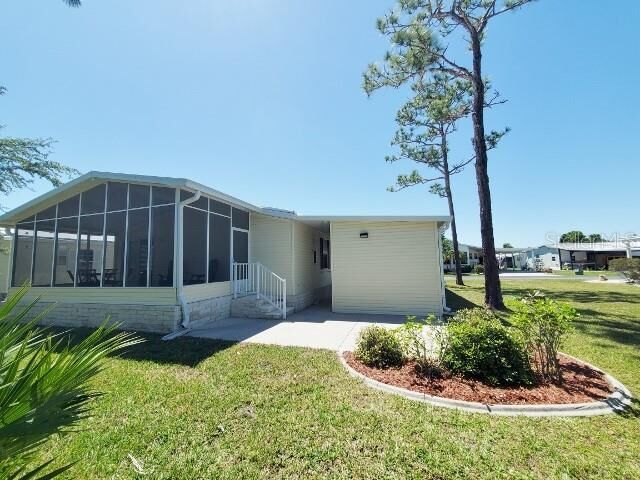 Property Photo: 29200 Jones Loop Road 125 FL 33950