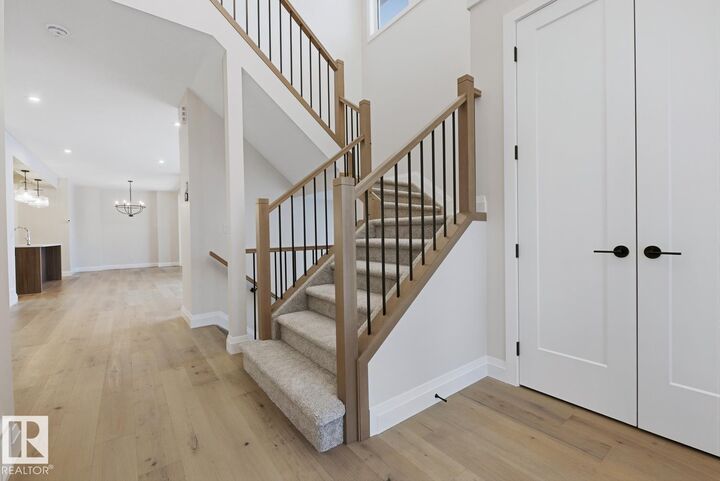 Property Photo: 6704 Crawford Way SW AB T6W 4L7