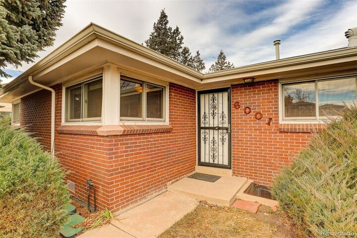 Property Photo:  6001 E Cedar Avenue  CO 80224 