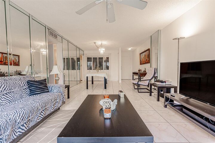 Property Photo:  200 178th Dr 406  FL 33160 