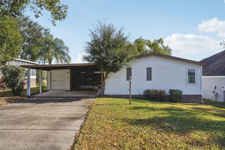 Property Photo:  1409 Torrey Pines Drive  FL 32159 