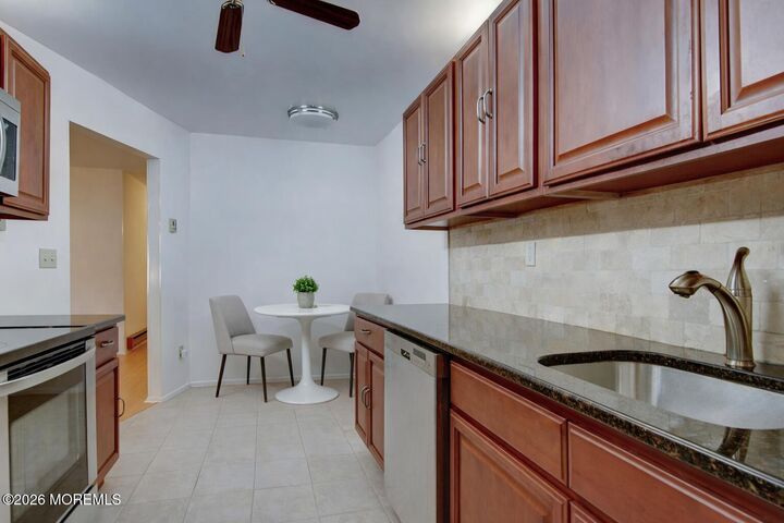 Property Photo:  59 Amberly Drive J  NJ 07726 