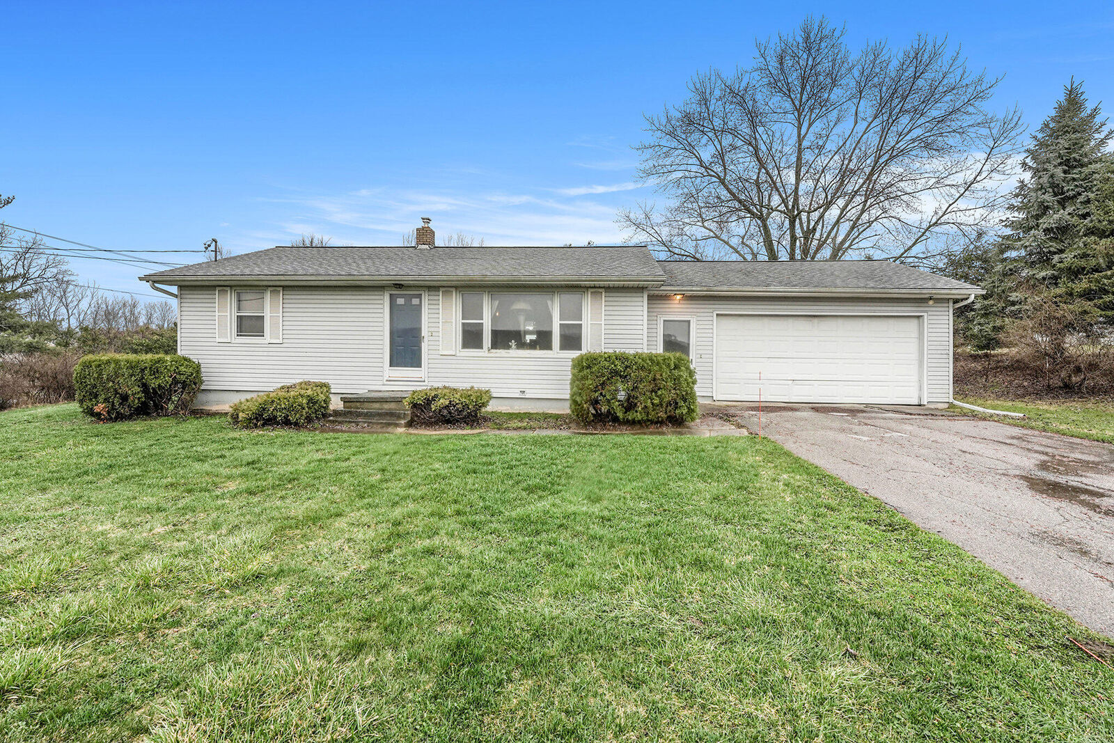 Property Photo: 1324 4 Mile Road NW MI 49544