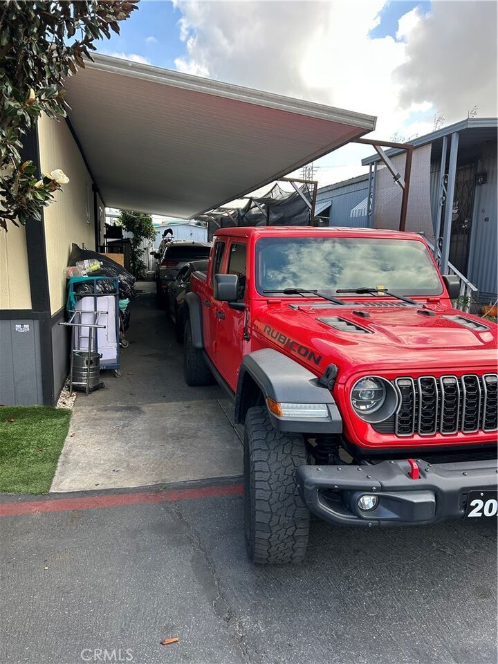 Property Photo:  16600 Orange Avenue 48  CA 90723 