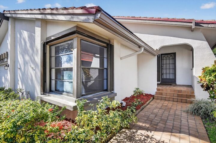 Property Photo:  661 Deer Creek Hollows Circle  FL 33442 