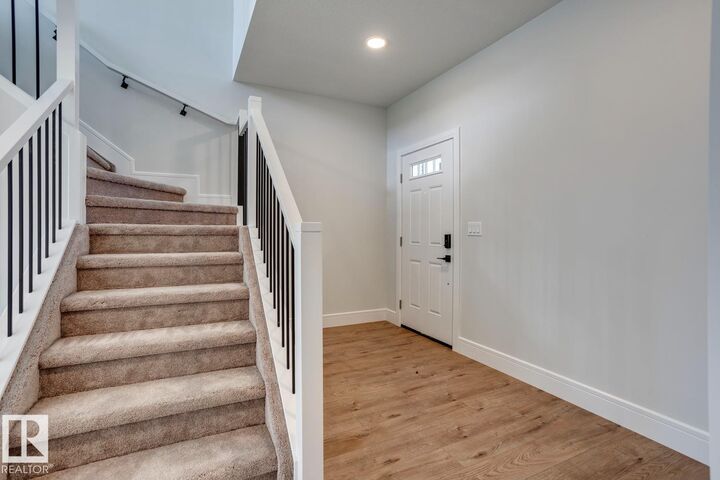 Property Photo:  54 Ficus Way  AB T8L 0Z6 