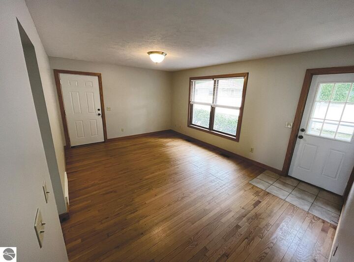 Property Photo:  837 Fern Street  MI 49686 