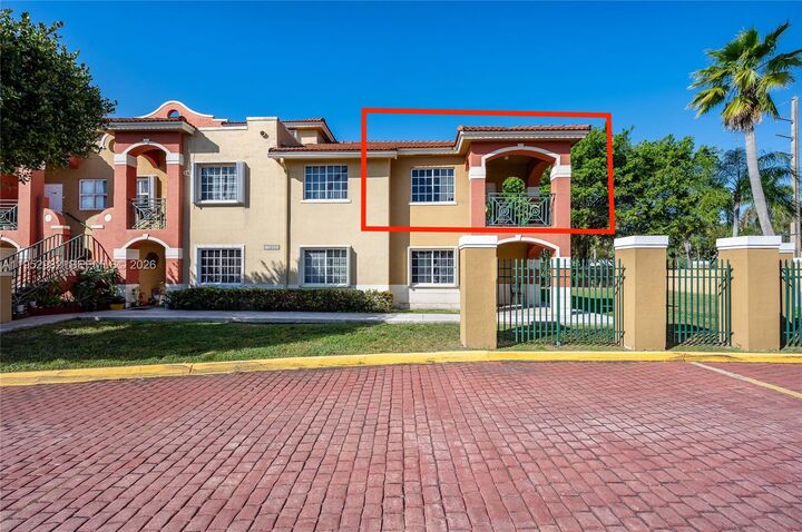 Property Photo:  15250 SW 134th Pl 102  FL 33177 