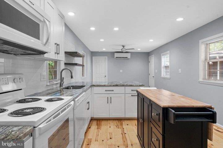 Property Photo:  44600 Tall Timbers Road Unit B  MD 20690 