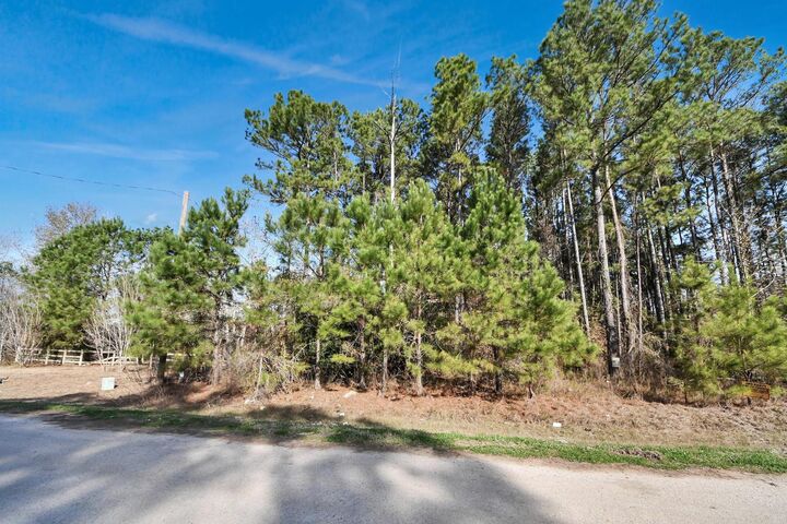 Property Photo:  1307 County Road 3479J  TX 77327 