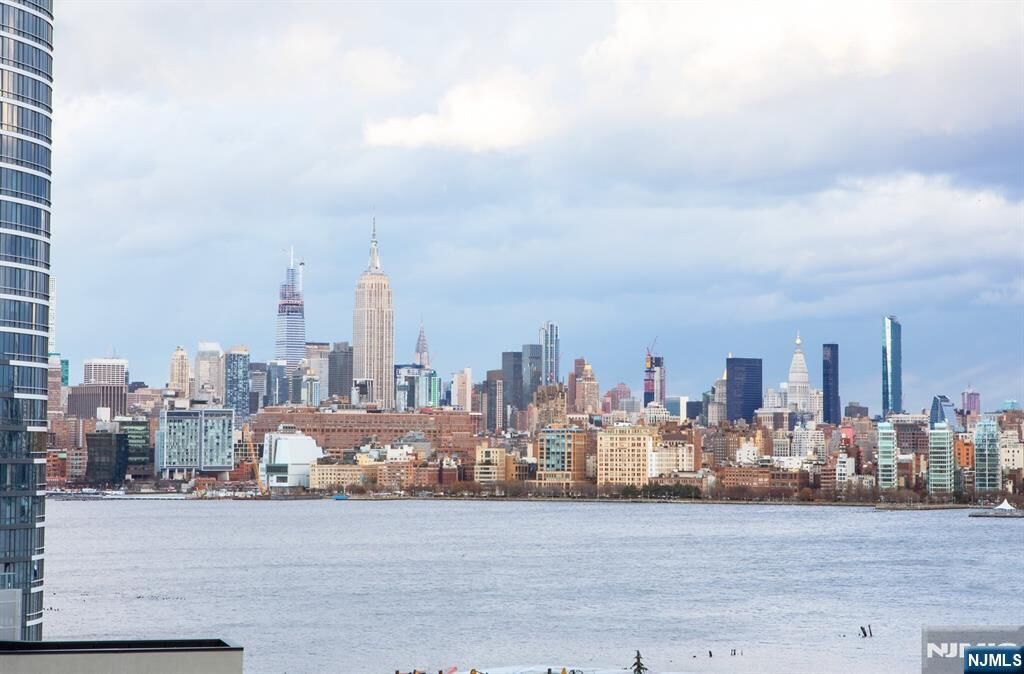 Property Photo: 20 Newport Parkway 1209 NJ 07310