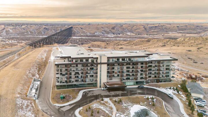 Property Photo: 102 Scenic Drive N 133 AB T1J 4L3
