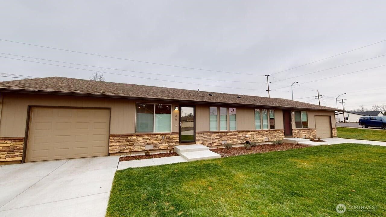 Property Photo:  144 & 146 S Tausick Way  WA 99362 