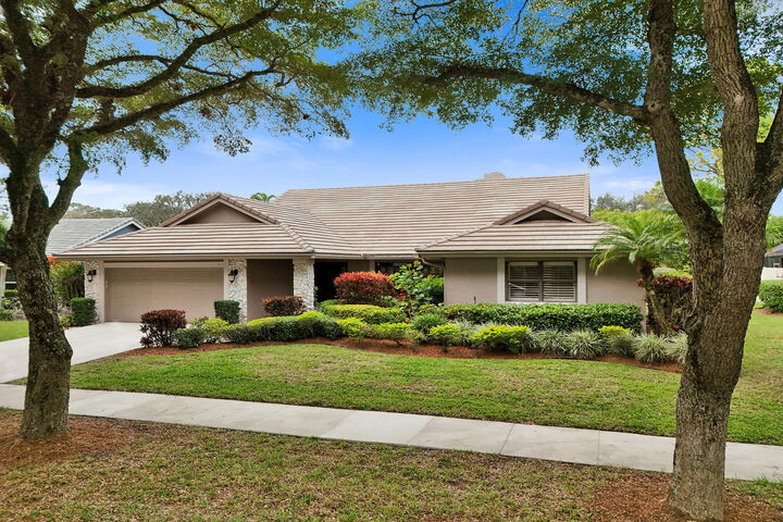 Property Photo:  2413 NW 40th Circle  FL 33431 